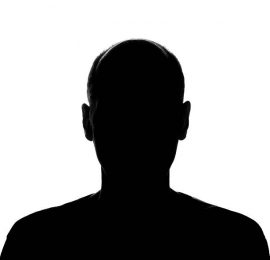 A Man's Head And Shoulders Silhouette Isolated On White.